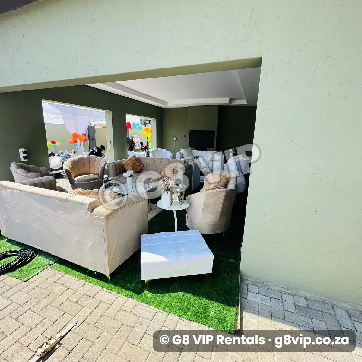 Chillas VIP couch setup under a patio