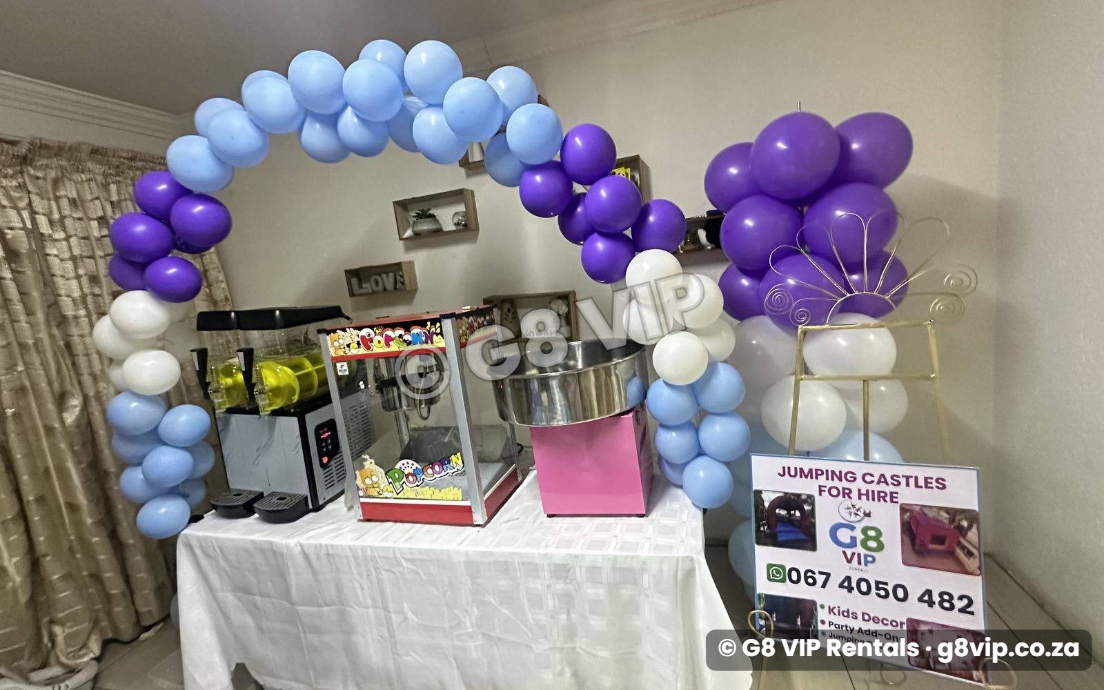 Popcorn and candy floss machines set up together